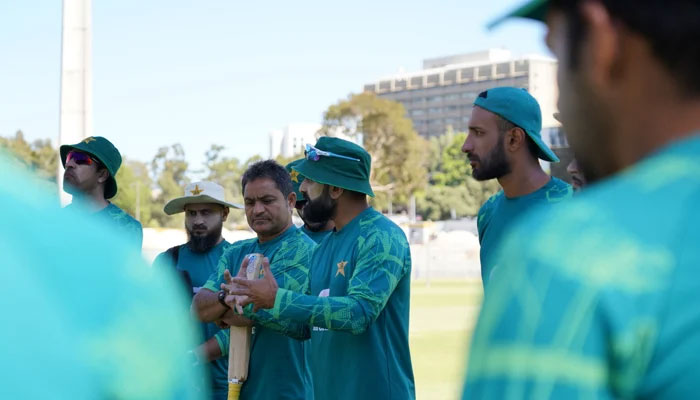 Mohammad Hafeez speaks during a training session. — PCB