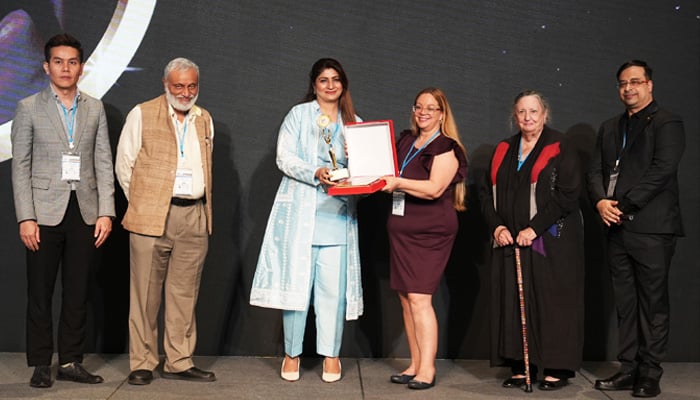 Multan Cantonment Public School Principal Beenish Saeed receives the Principal of the Year prize at the Asia Education Conclave Awards 2023. — Instagram/asiaeducationconclave