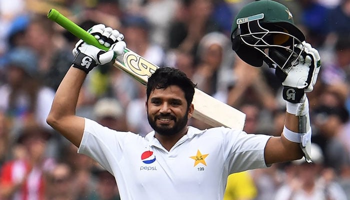 Batsman Azhar Ali celebrates after scoring his century against Australia in this undated picture.— AFP/File