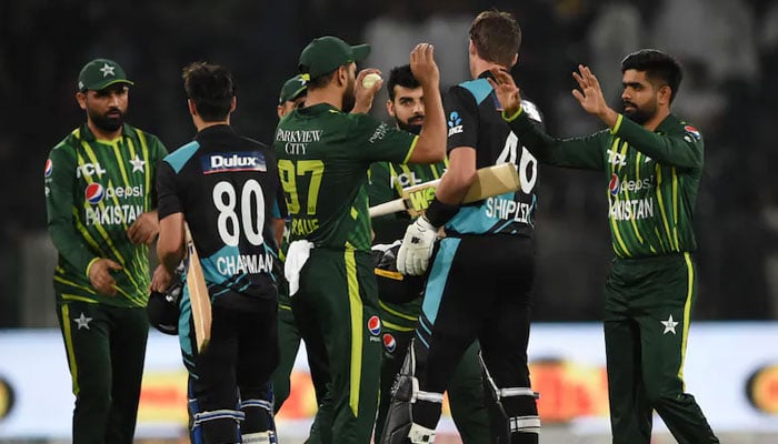 Pakistani fielders celebrate a win against New Zealand. — AFP/File