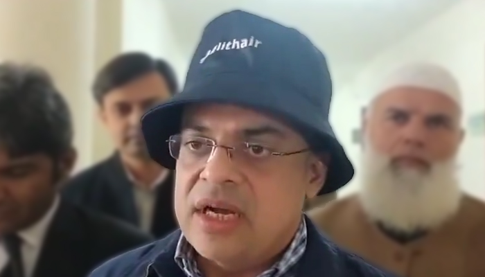 Ahad Cheema, adviser to caretaker prime minister on establishment, speaks with the journalists in this still taken from a video. — X/@MurtazaViews/File