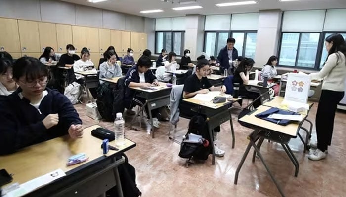 South Korean students wait to take the annual College Scholastic Ability Test, known locally as Suneung, at a school in Seoul. — AFP/File