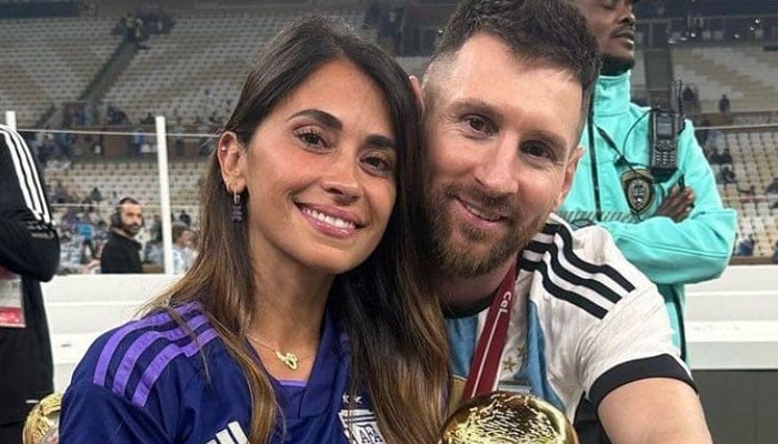 Lionel Messi with Antonela Roccuzzo during a football game. — Instagram/@roccuzzo