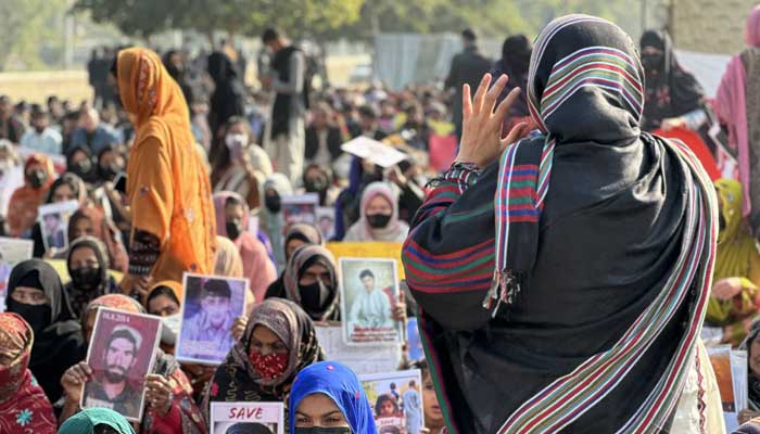 Baloch protesters stage a sit-in outside Islamabad Press Club against enforced disappearances on December 23, 2023. — X/@BYCislamabad