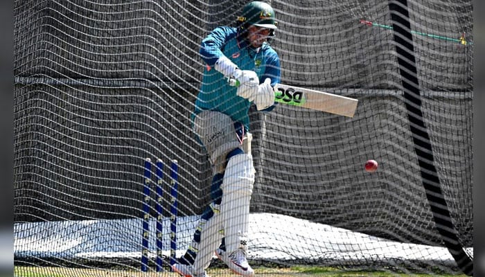 Australian batsman Usman Khawaja bats in the nets during a practice session at the Melbourne Cricket Ground (MCG) in Melbourne on December 24, 2023, ahead of the second cricket Test match against Pakistan. — AFP