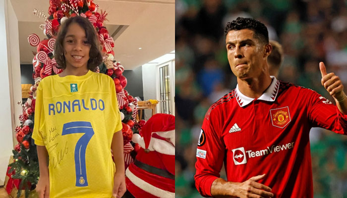 Marcelo’s son Liam Alves (left) shows the Christmas gift given to him by Cristiano Ronaldo. — Instagram/liamalvesv/AFP