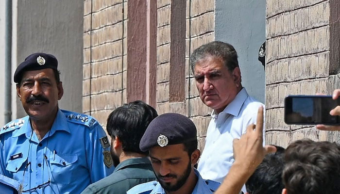 Shah Mahmood Qureshi, Vice Chairman of Pakistan Tehreek-e-Insaf (PTI) and former foreign minister is seen outside a special court after he was granted a four-day physical remand in Islamabad on August 21, 2023. — AFP