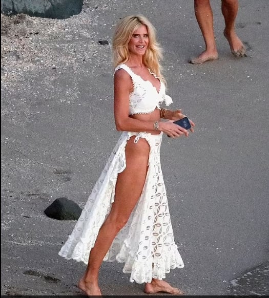 Victoria Silvstedt stuns in beachwear, showcasing model physique on luxurious trip