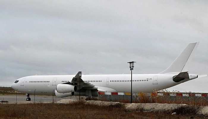 The plane carrying Indian passengers was held in France. — AFP