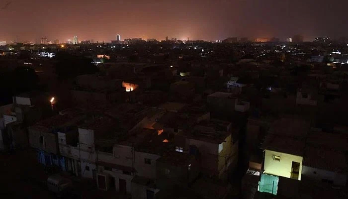 Entire neighbourhood plunges into darkness during loadshedding in Karachi. — AFP/File