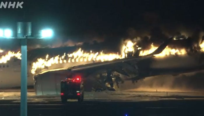 Japan Airlines A350 airplane is on fire at Haneda International Airport in Tokyo, Japan January 2, 2024. — X/@NHKWORLD_News