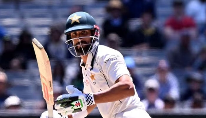 Pakistan batsman Shan Masood plays a shot on the fourth day of the second cricket Test match between Australia and Pakistan at the Melbourne Cricket Ground (MCG) in Melbourne on December 29, 2023. — AFP