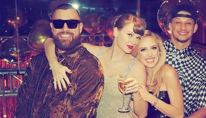 Taylor Swift and Travis Kelce shared a New Year’s kiss while celebrating with friends and family
