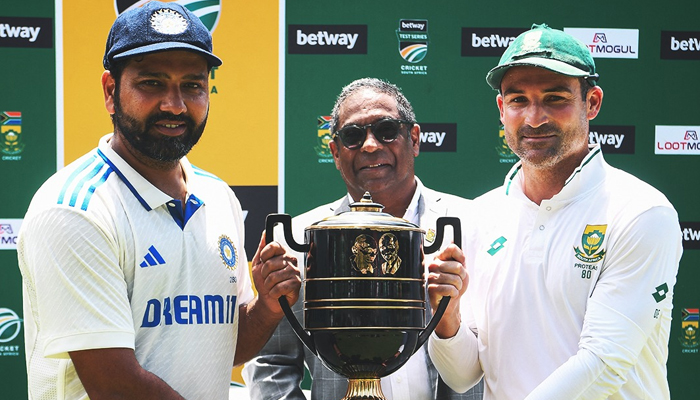 Indian captain Rohit Sharma (left) and South African skipper Dean Elgar share the trophy after the two-match Test series is tied 1-1. — Facebook/ICC