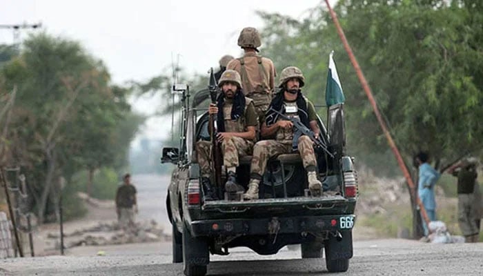 Pakistan Army soldiers patrol in a vehicle in this undated photo. — AFP/File