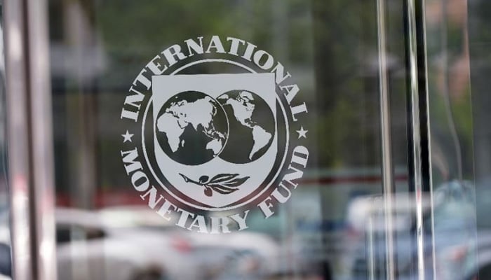 IMFs logo on a buildings door. — AFP/File