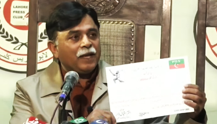 PTI-Nazriati Chairman Akhtar Iqbal addressing a press conference in Lahore, on January 13, 2023, in this still taken from a video. — Geo News