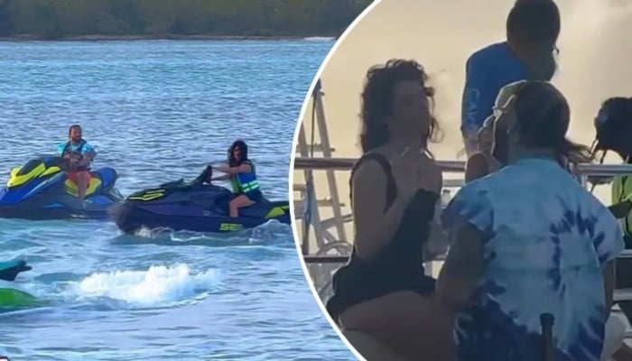 The pair soaked up the sun on a boat and indulged in jet skiing