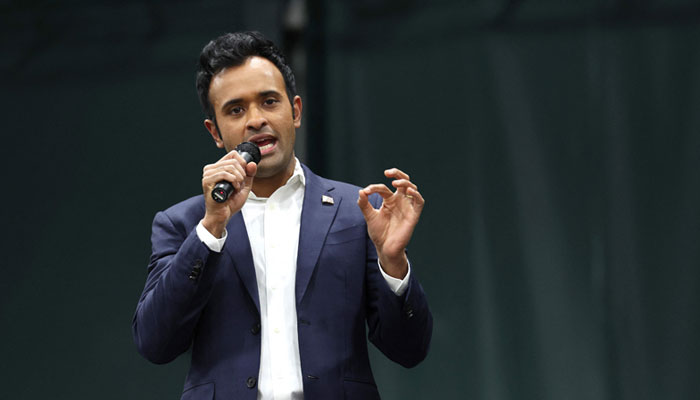 Republican presidential candidate Vivek Ramaswamy speaks to voters at a caucus site at the Horizon Event Center on January 15, 2024, in Des Moines, Iowa. —AFP