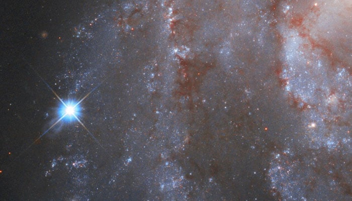 An image of a supernova in a galaxy. — Hubble/Nasa/File
