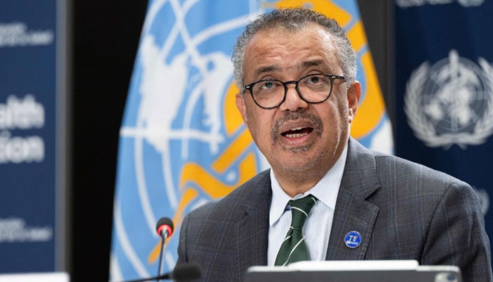 This handout photograph taken and released on December 15, 2023, by the World Health Organization (WHO), shows the Director General of the World Health Organization, Tedros Adhanom Ghebreyesus delivering remarks during a press conference with press correspondents to the United Nations (ACANU) at WHO headquarters in Geneva. —AFP
