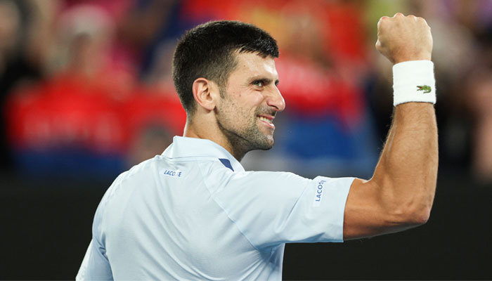 Serbia´s Novak Djokovic celebrates after victory against France´s Adrian Mannarino during their men´s singles match on day eight of the Australian Open tennis tournament in Melbourne on January 21, 2024. — AFP