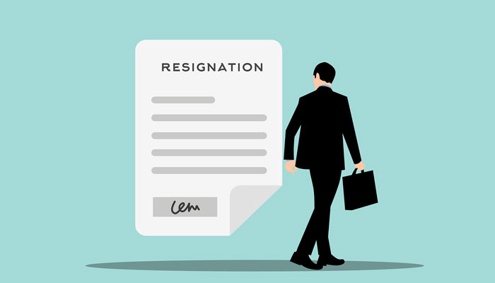 Image of an employee walking out after receiving a resignation letter. — Pixabay