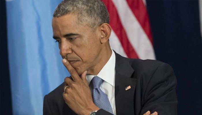 Barack Obama gestures during a gathering. — AFP/File
