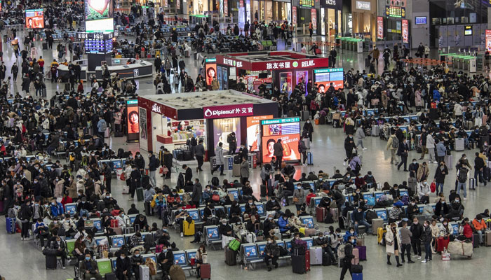 Travelers at the Hongqiao Railway Station ahead of Lunar New Year in Shanghai, on Jan. 23. — Bloomberg