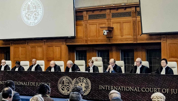 ICJ President Joan Donoghue (centre) speaks at the International Court of Justice (ICJ) prior to the verdict announcement in the genocide case against Israel, brought by South Africa, in The Hague on January 26, 2024.