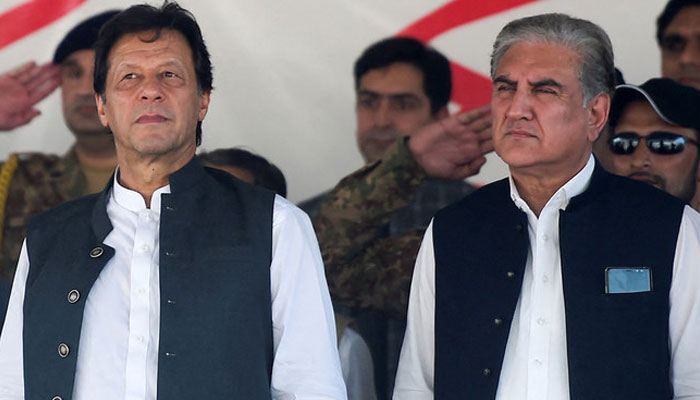 PTI founder Imran Khan (left) and partys senior leader Shah Mahmood Qureshi. — AFP/File