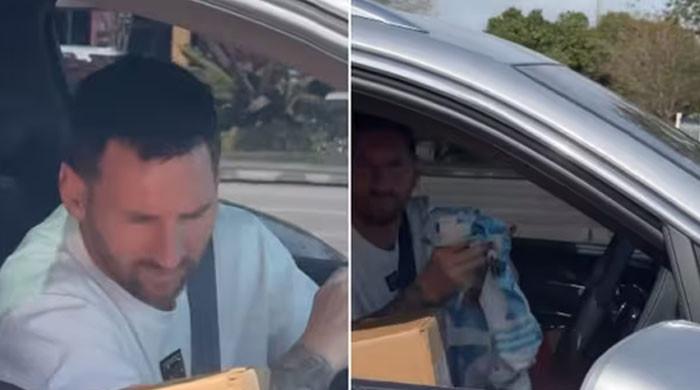 VIDEO: Lionel Messi signs Argentina jersey for fan amid traffic