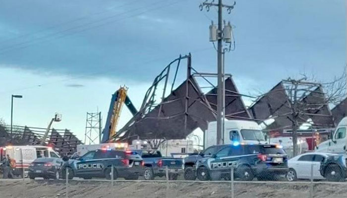 Police and emergency vehicles respond to the scene of a building collapse near the Boise Airport, Idaho on January 31, 2024. — Idaho Statesmen via Diego Garcia