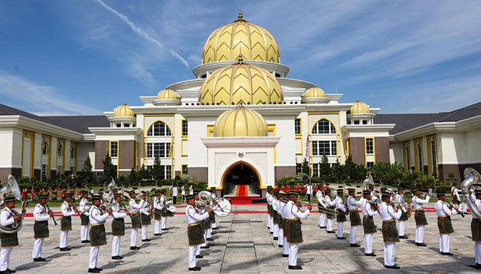 A military band performs during a welcoming ceremony for the 17th King of Malaysia Sultan Ibrahim Iskandar at the National Palace in Kuala Lumpur, on January 31, 2024. — AFP
