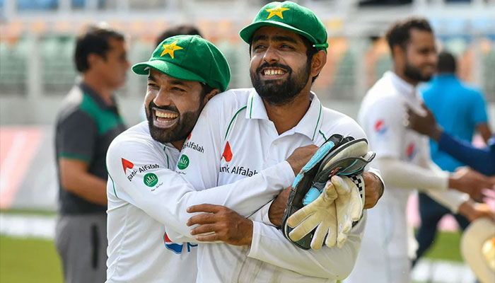 Mohammad Rizwan (left) and Babar Azam were all smiles, West Indies v Pakistan, 2nd Test, Kingston, 5th day, August 24, 2021. — AFP