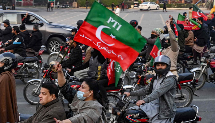 Supporters and activists of Pakistan Tehreek-e-Insaf (PTI) party take part in an election campaign rally in Lahore on January 28, 2024, ahead of the upcoming general elections. — Reuters
