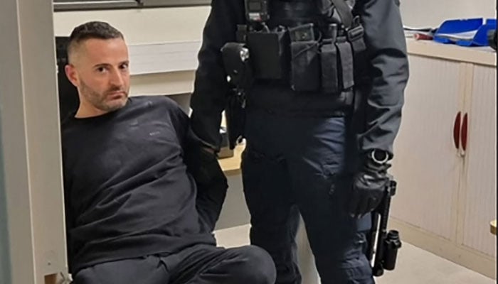 This handout photograph released by the Italian Carabinieri press office on February 2, 2024, shows the arrest of Italian mafia boss Marco Raduano, in Bastia, Corsica. — AFP