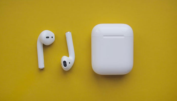 AirPods and its case. — Unsplash