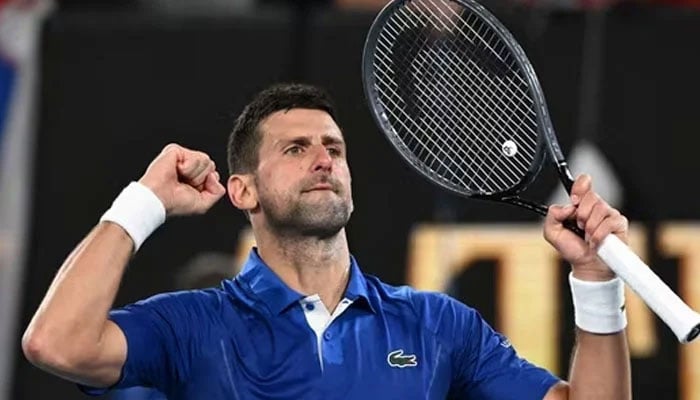 Serbian tennis star Novak Djokovic celebrates after victory against Argentina’s Tomas Etcheverry during their mens singles match in the Australian Open on January 19, 2024. — AFP