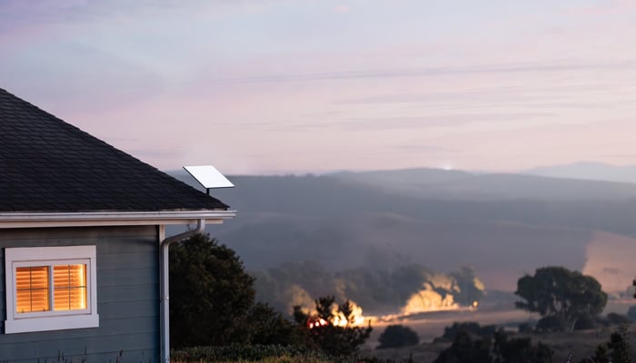 This image released on January 31, 2024, shows a Starlink satellite developed by Elon Musks SpaceX company on the roof of a house. — X/@Starlink