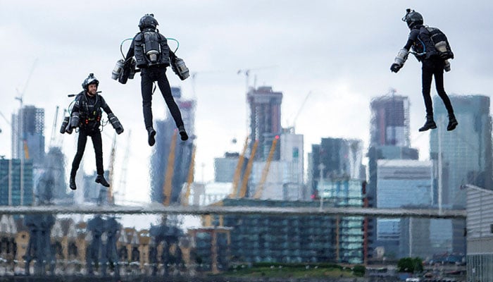 The image shows three men flying in their jet suits. — Sps Airbuz/File