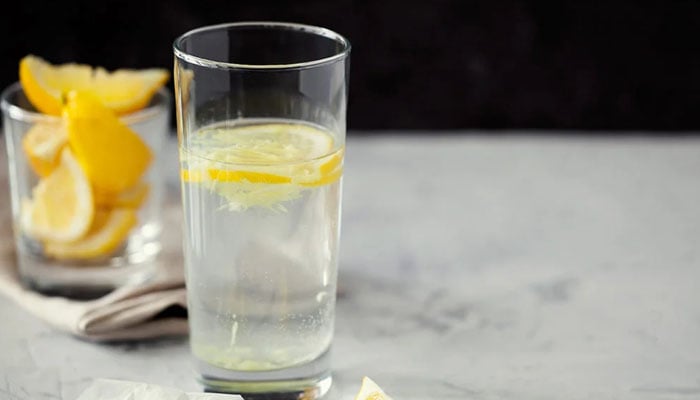 Lemon water kept on a table. — Pinterest/File
