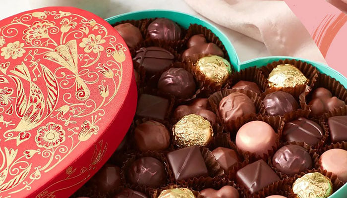 The image shows a pack of chocolates on occasion of Valentines Day. — Glamour