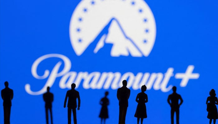 Toy figures of people are seen in front of the displayed Paramount + logo, in this illustration taken January 20, 2022. —Reuters