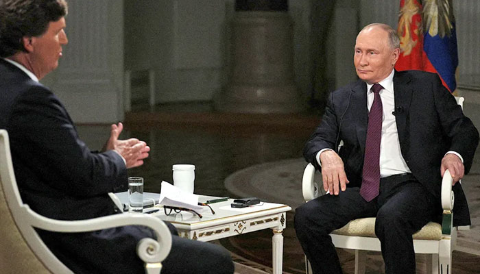 Russian President Vladimir Putin being interviewed by US television host Tucker Carlson in Moscow. — Sputnik