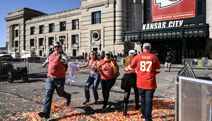 Fans flee as shots were fired after the celebration of the Kansas City Chiefs winning Super Bowl LVIII in Kansas City, Missouri, US on February 14, 2024. — AFP
