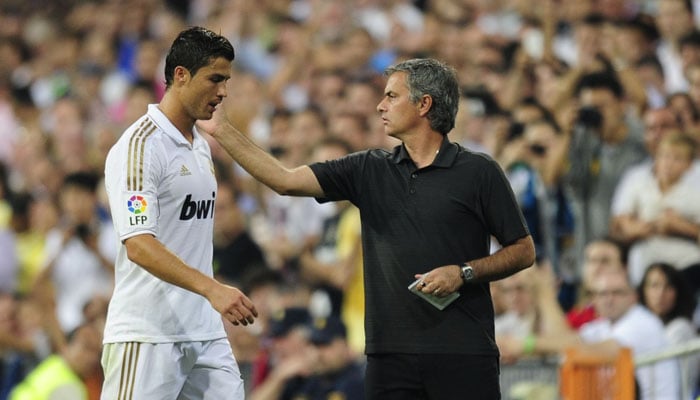 Cristiano Ronaldo and Jose Mourinho spotted together during a match. — AFP/File