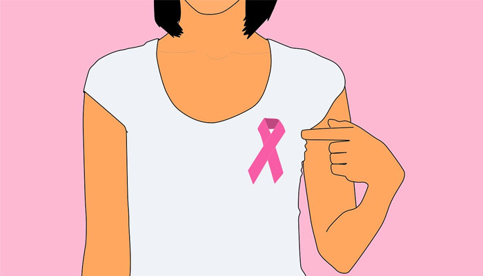 A pictorial image of a woman wearing a pink ribbon for breast cancer awareness. — Pixabay
