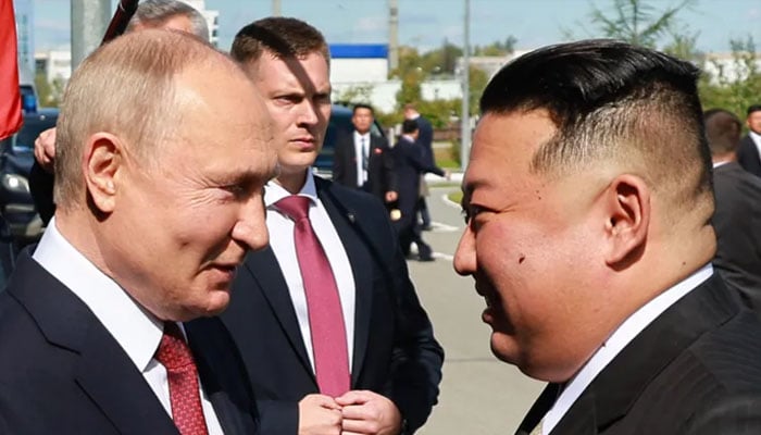 Vladimir Putin and Kim Jong Un at their summit in September. — AFP/File