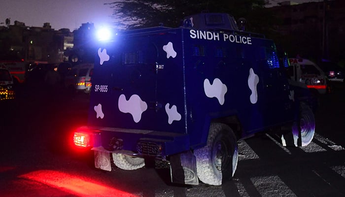 Security personnel seen near Karachi Police Office in Karachi on February 17, 2023. — AFP